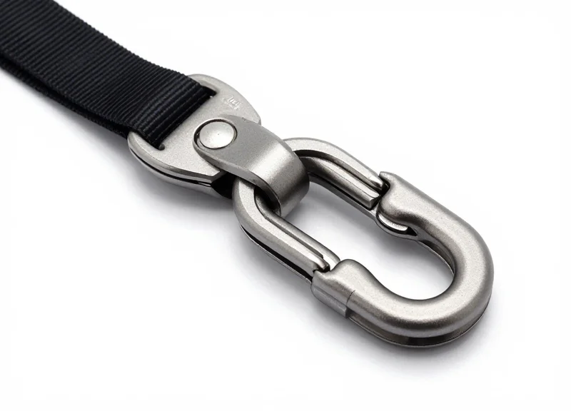 Close-up of a high-tech tension-adjustable lanyard mechanism on a white background