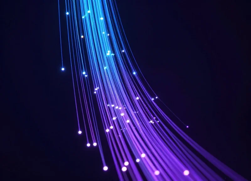 Abstract visualization showing downward trending light streams representing retail loss reduction.
