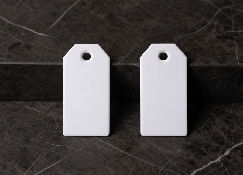 Comparison of two different types of security tags for high-end cosmetics.