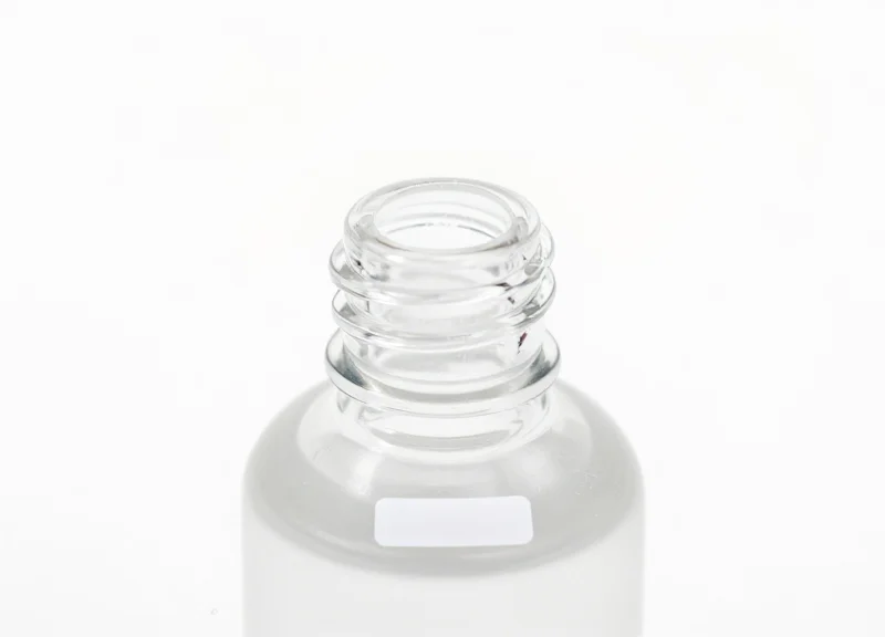 A bottle of oil with an RFID tag correctly positioned for optimal signal