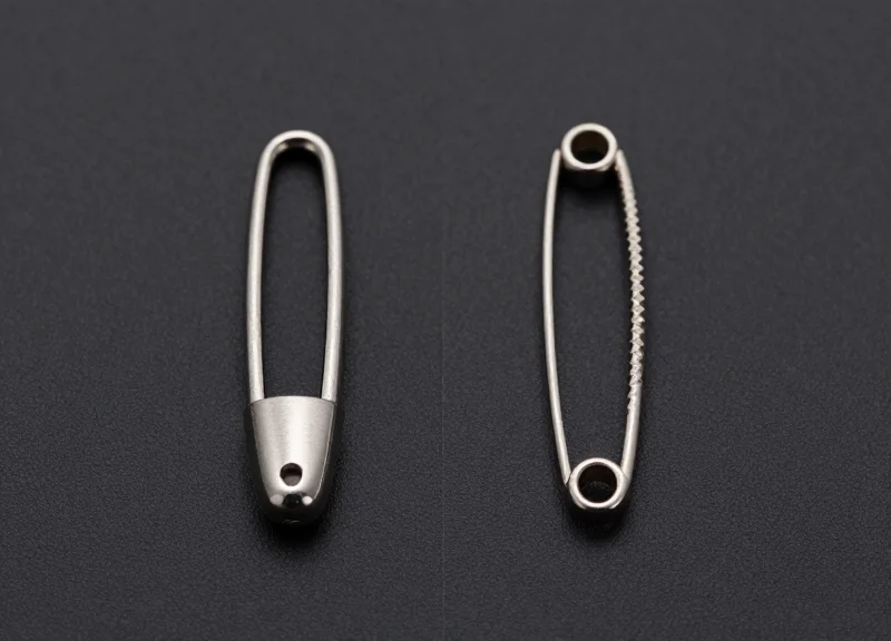 Side-by-side comparison of a smooth stainless steel pin and a grooved security pin