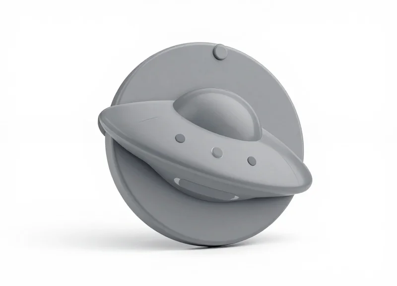 A circular UFO style security hard tag for retail clothing on a pure white background.