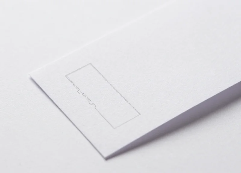 Macro close-up of a standard-looking retail price label with hidden internal components