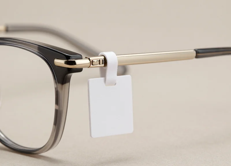 Shielding Sensitive Frames: The Technical Guide to Implementing Non-Damaging Temple Tags for Acetate and Metal