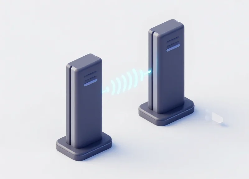 Isometric view of two retail security pedestals synchronized via signal lines