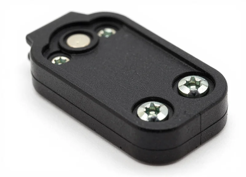 Macro shot of a rugged industrial RFID tag showing high durability.