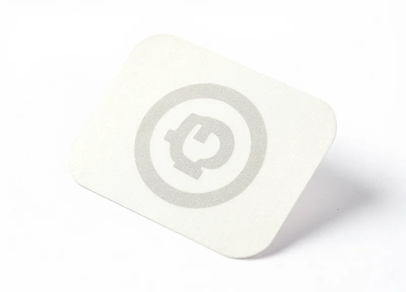Macro shot of a high-performance cryogenic RFID label showing the embedded chip texture.