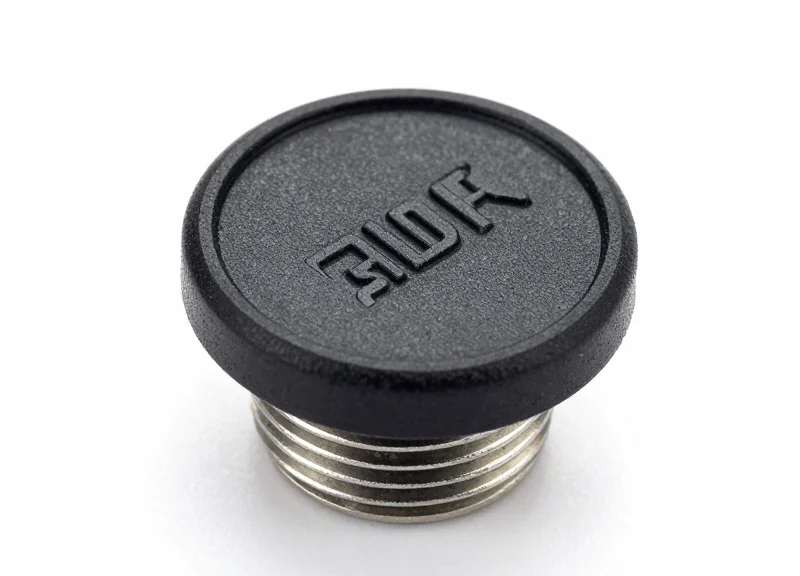 A heavy-duty industrial RFID bolt tag with a threaded metallic base and a rugged sensor head.
