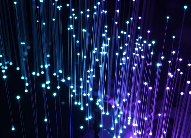 Abstract visualization of dense data streams and nodes representing high-speed tag processing.