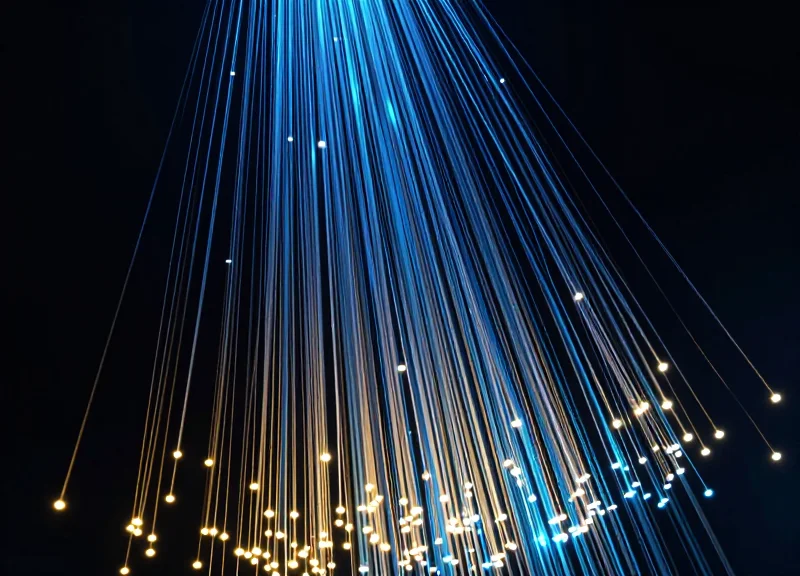 Abstract visualization of 99.9% data accuracy with glowing nodes and upward light trails