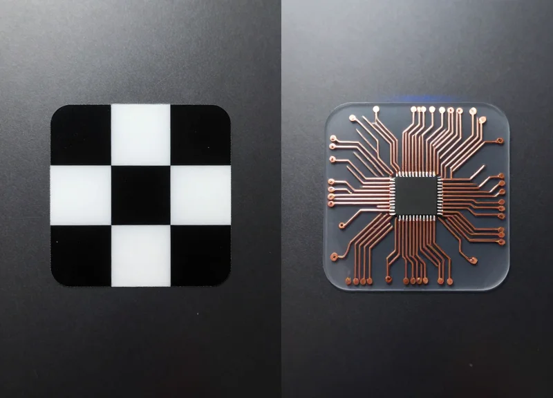 A side-by-side comparison of a standard square QR code pattern on the left and a translucent passive RFID smart label with visible copper antenna coils on the right.