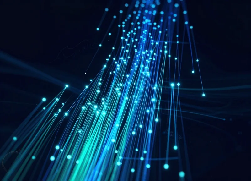 Abstract glowing data nodes and light trails representing efficiency and error reduction in a digital environment.